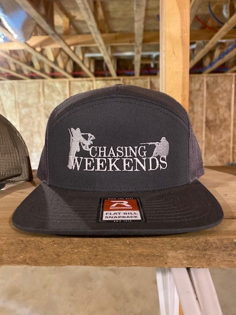 Charcoal Chasing Weekends Logo